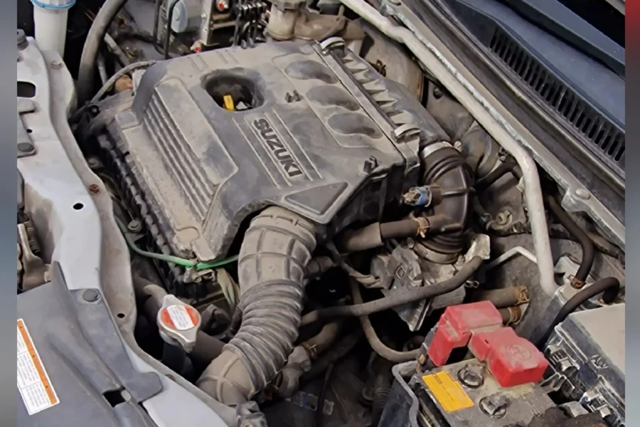 Dusty Suzuki engine bay covered in grime before engine clean by Hydrowax