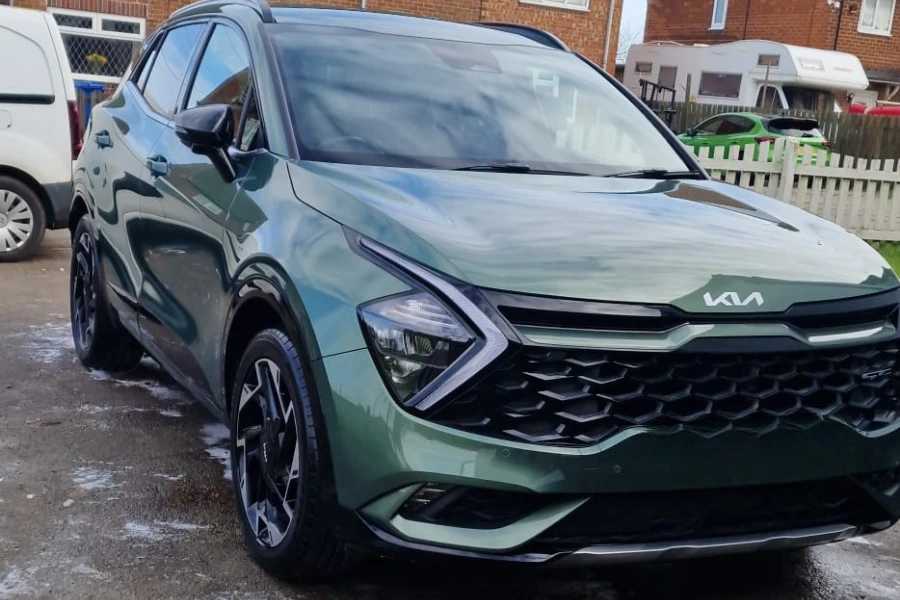 Clean green Kia Sportage gleaming after exterior valet by Hydrowax