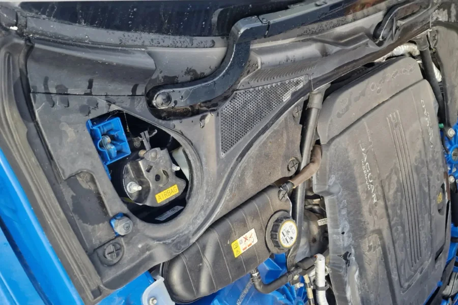 Dirty Jaguar engine bay with grime and dust before engine clean by Hydrowax