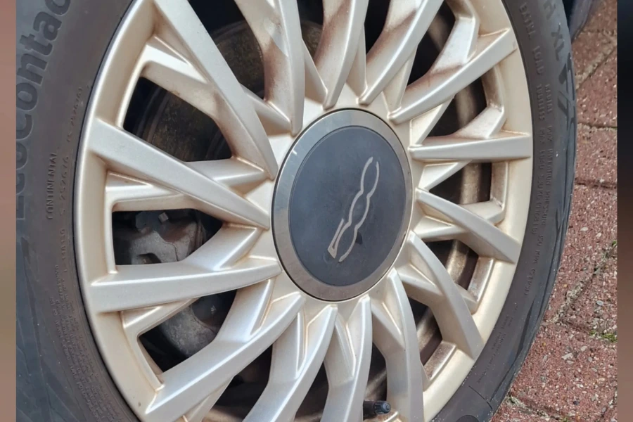 Dull and marked Fiat 500 alloy wheel before cleaning by Hydrowax