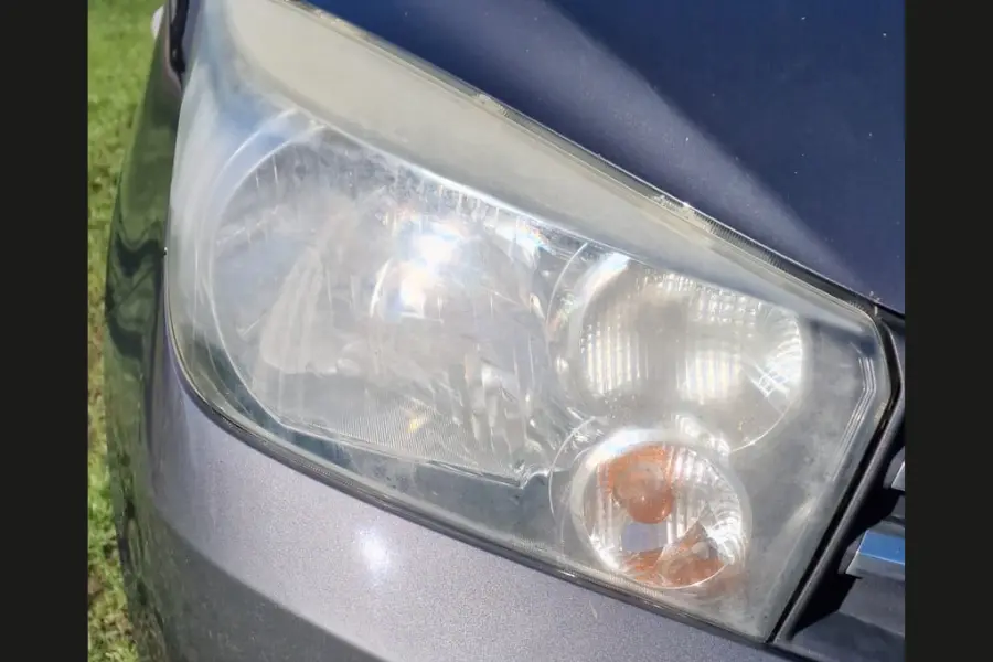Yellowed and hazy headlight before headlight restoration by Hydrowax, East Yorkshire
